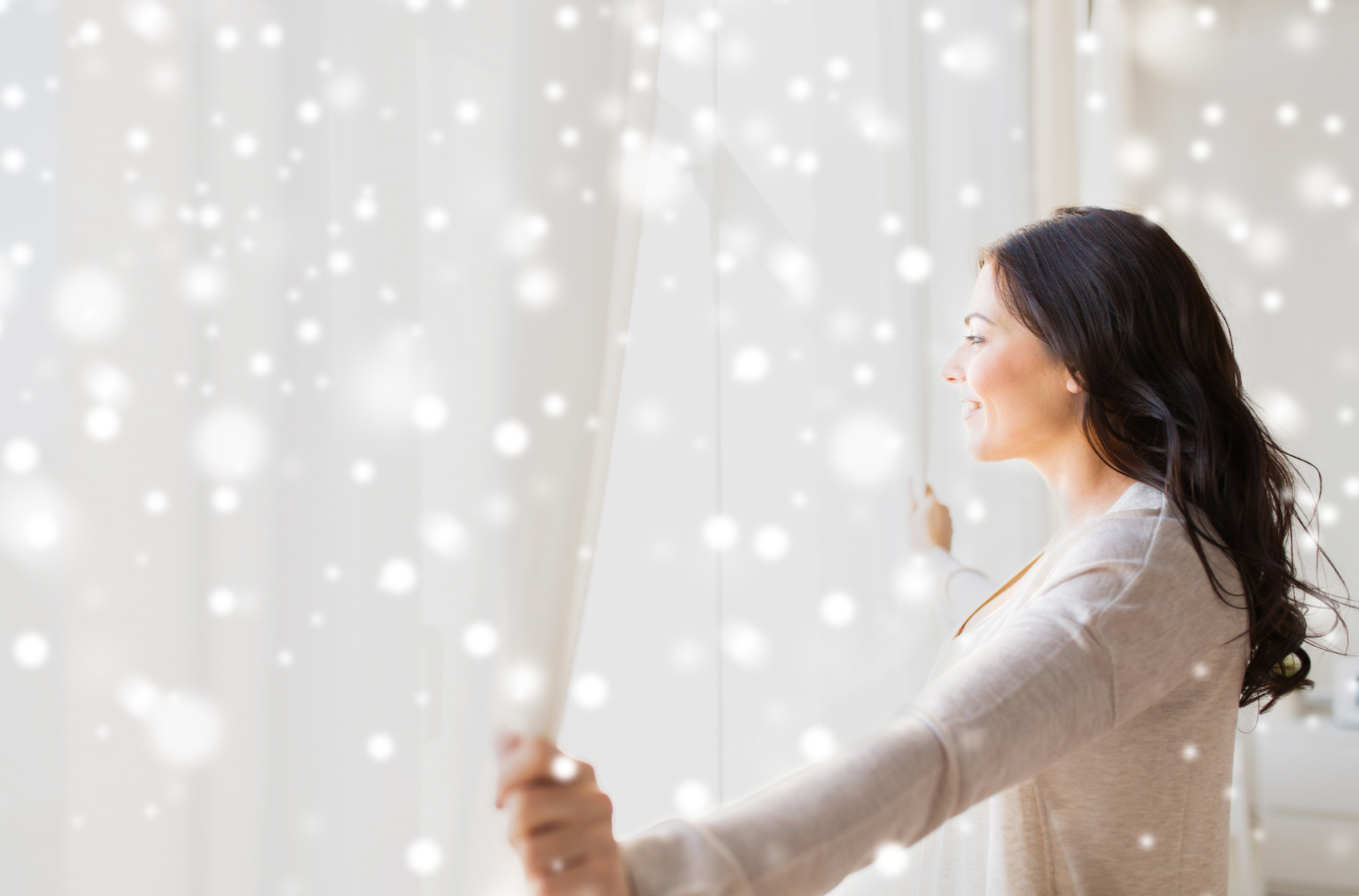 Close up of Woman Opening Window Curtains